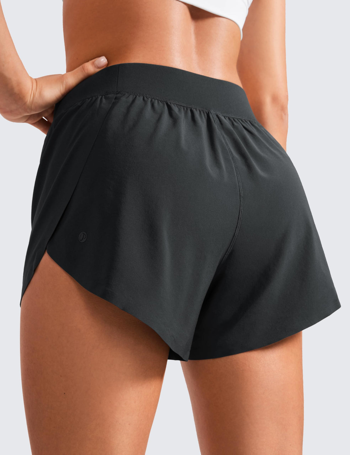 CRZ YOGA Mid Waisted Dolphin Athletic Shorts for Women 4" Lightweight High Split for Gym Workout with Liner Quick Dry Black Medium
